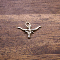 Sterling silver steer charm with detailed bull figure and top loop bail