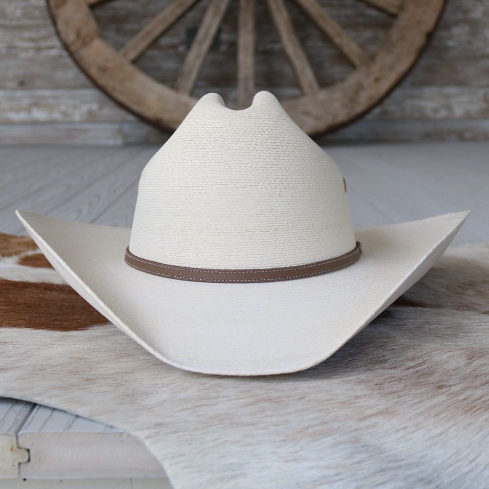 Light straw cowboy hat with brown band and pointed crown detail