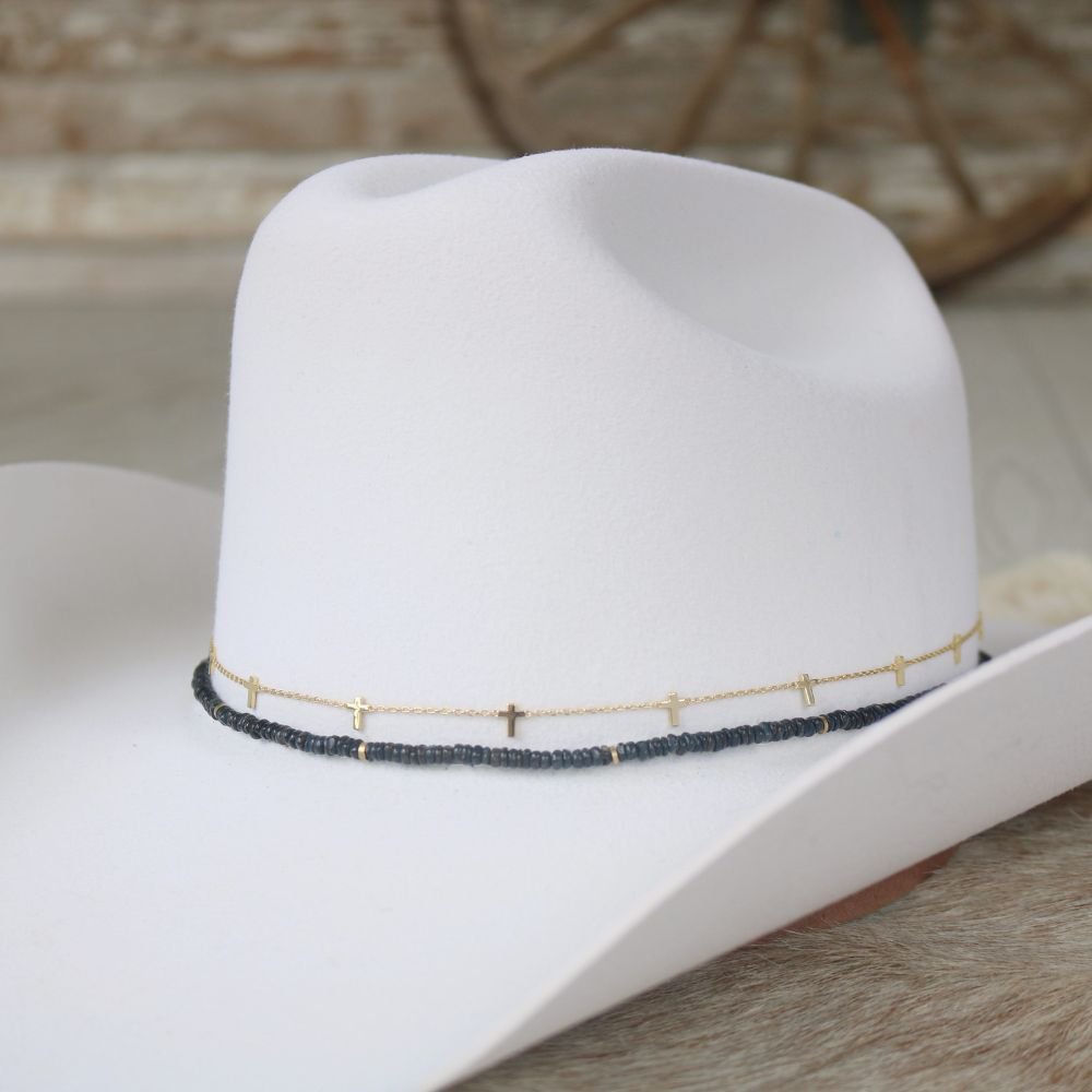 Cleo beaded hat band with gold cross charms on white felt hat