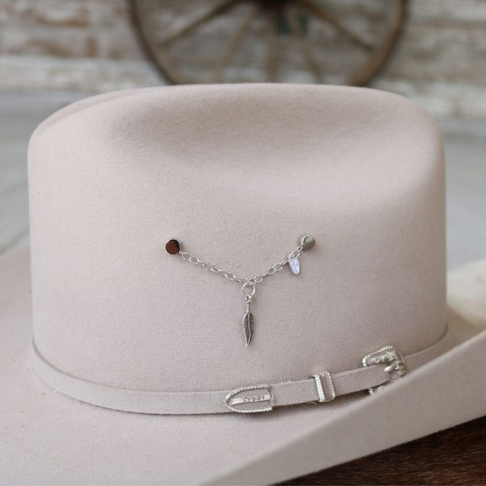 Sterling silver feather charm pendant on a delicate chain