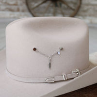 Sterling silver feather charm pendant on a delicate chain