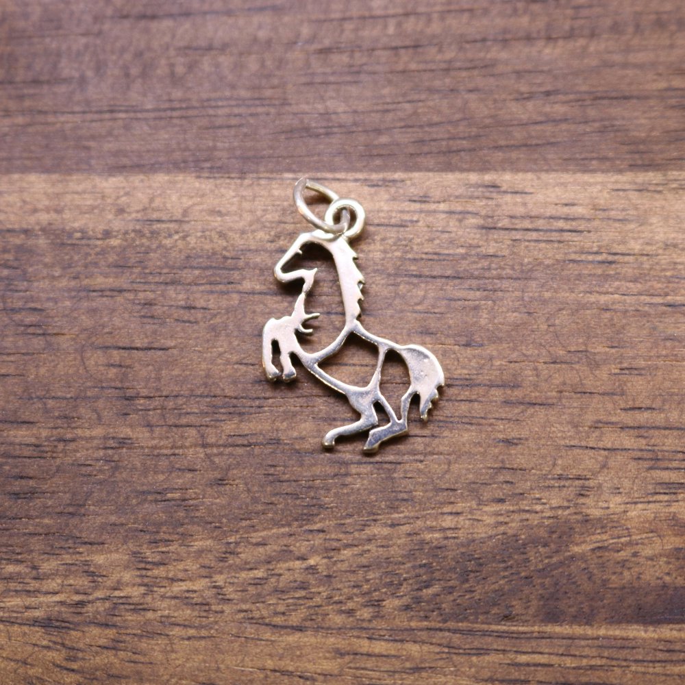 Sterling silver rearing horse charm with loop bail, detailed side profile