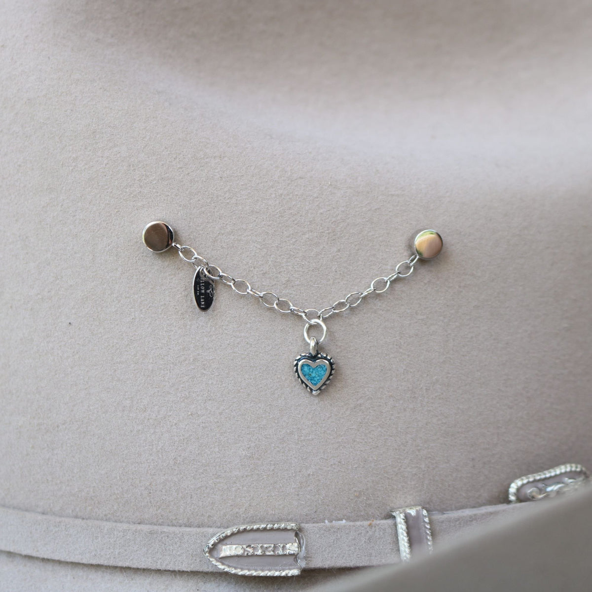 Heart charm inlay bracelet with turquoise heart pendant and small dark charm links