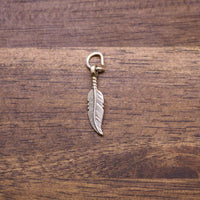 Sterling silver feather charm with loop and clasp hardware