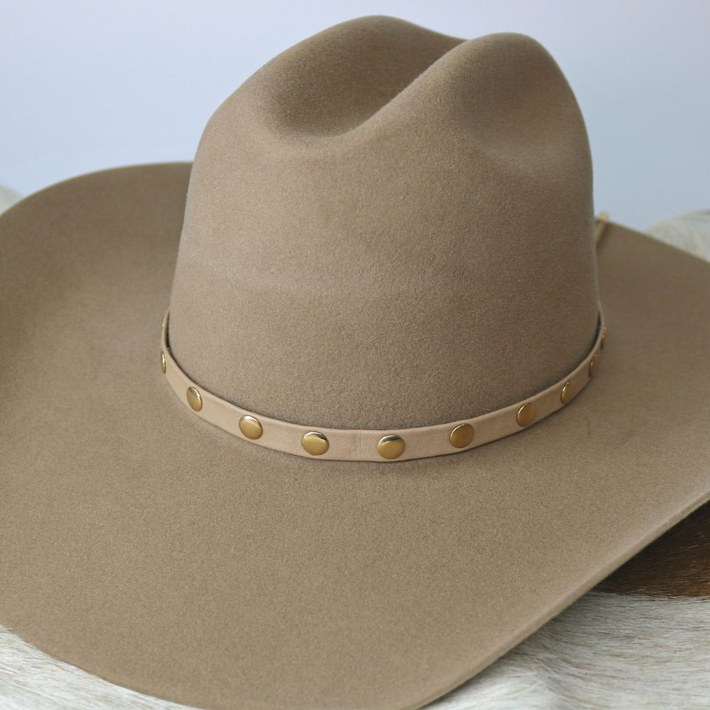 Taupe felt hat with brown leather band studded with brass rivets