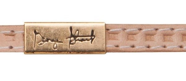 Gold hatband nameplate with cursive script and stitched leather trim