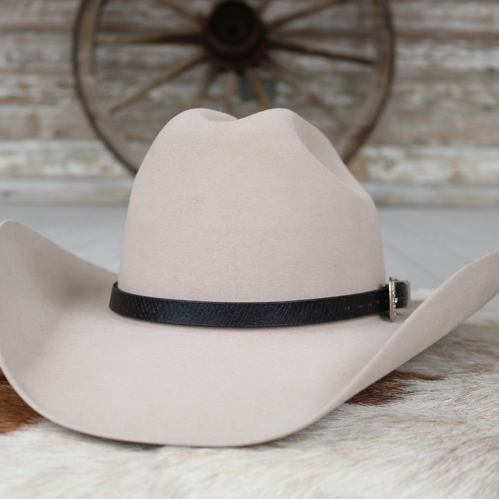Light tan cowboy hat with black leather hat band and side buckle