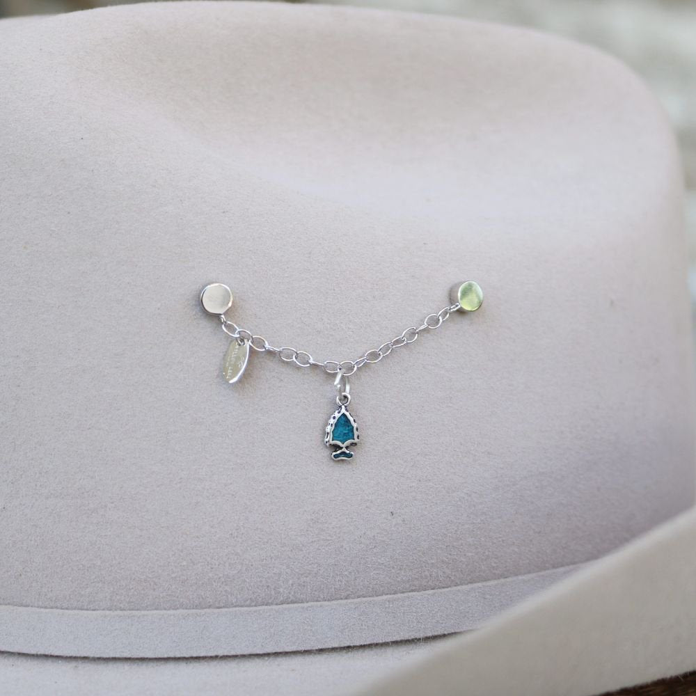 Silver charm bracelet with turquoise inlay arrowhead charm on chain