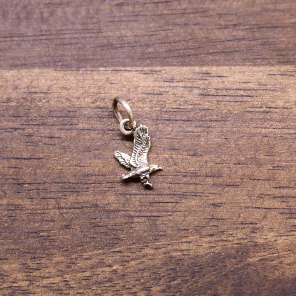 Sterling silver eagle charm with loop bail, detailed wings