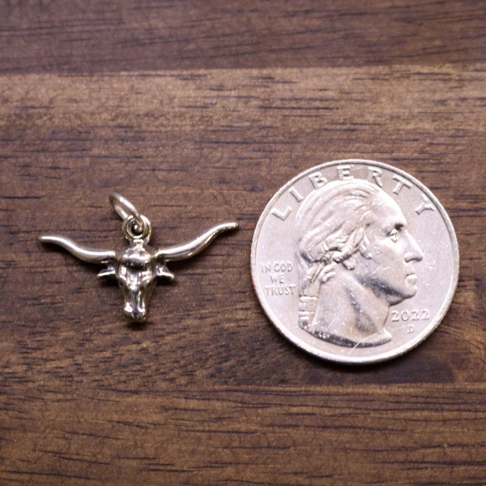 Sterling silver steer charm with detailed bull head and horns pendant