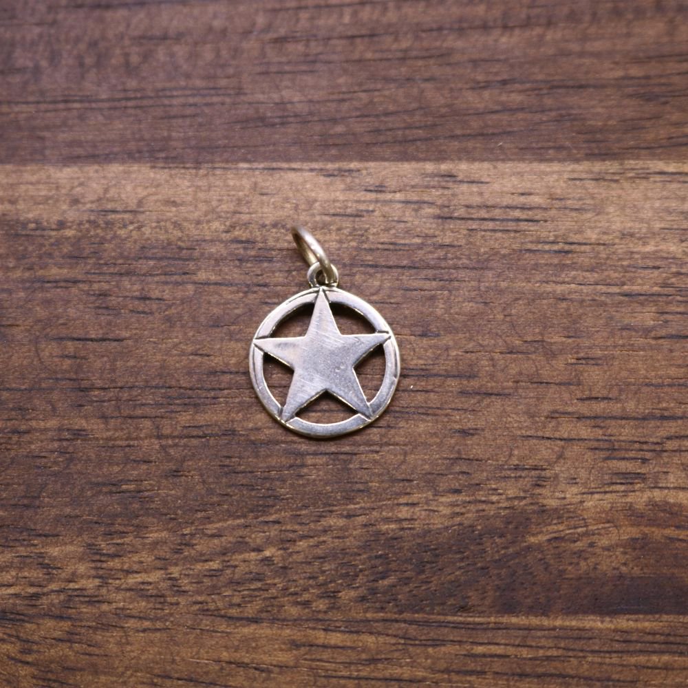 Sterling silver star sheriff charm with circular frame and top bail