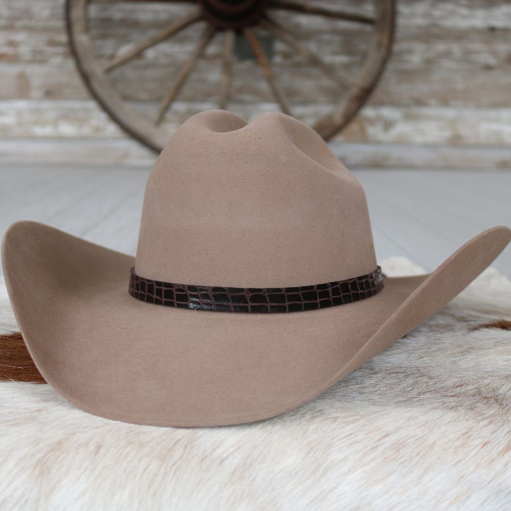 Tan cowboy hat with dark brown croc-pattern leather band