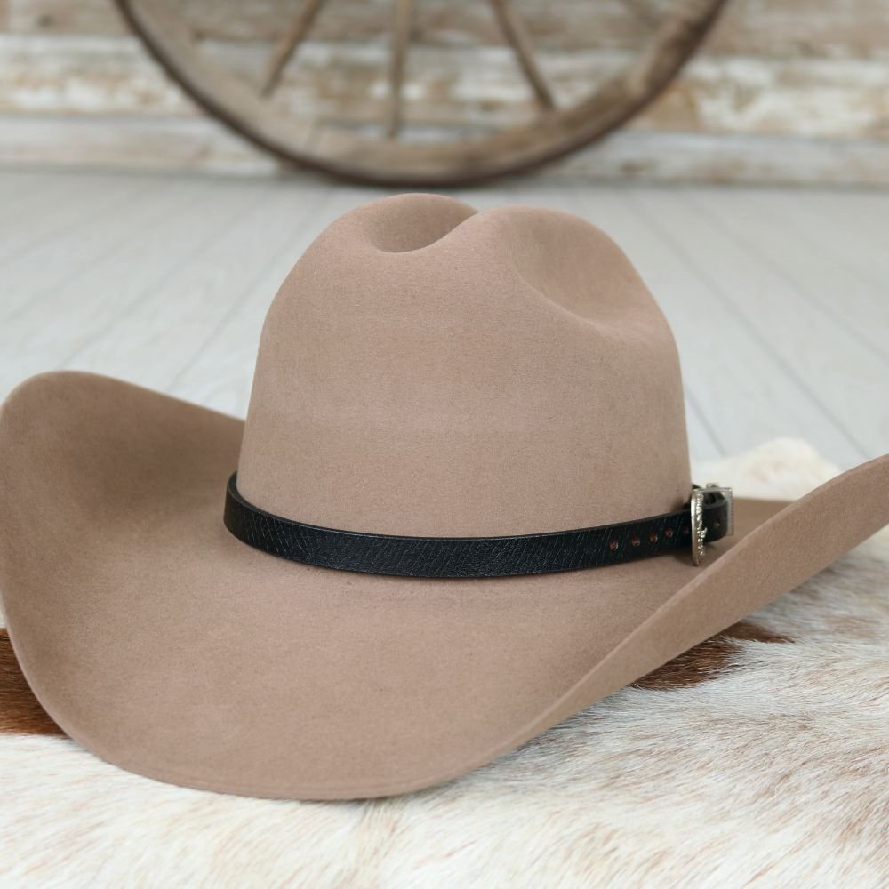 Tan cowboy hat with black leather band and buckle closure