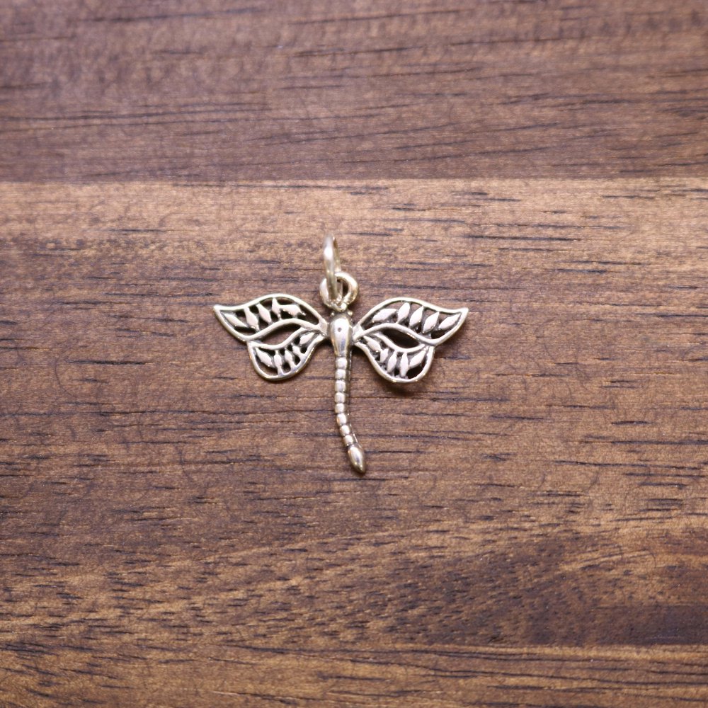 Sterling silver dragonfly charm with pierced wings and dangling bead body