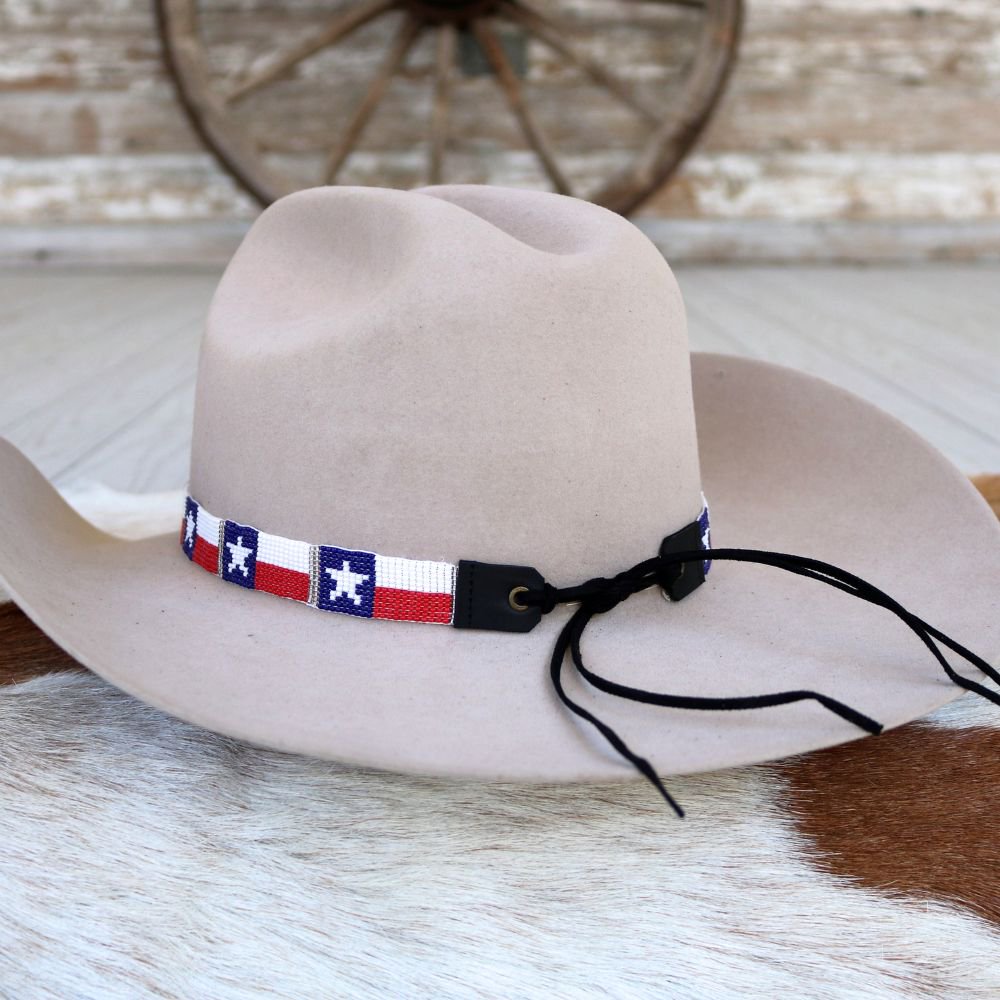 Beaded Texas flag hat band with black tie cords and red white blue pattern