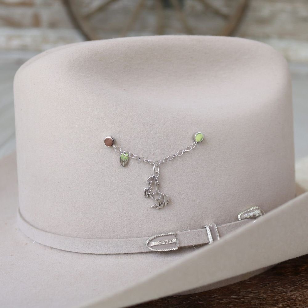 Sterling silver rearing horse charm on chain with green beads on a hat