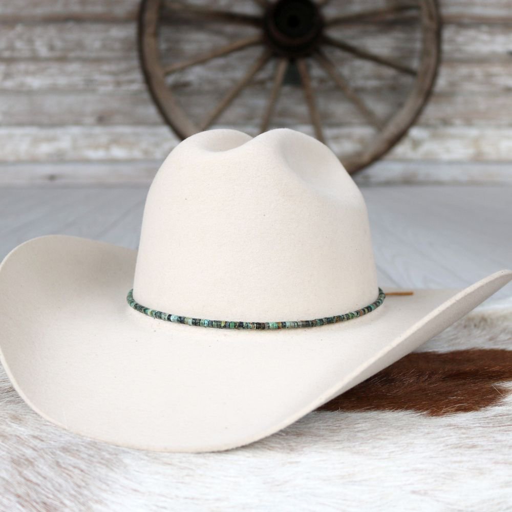 White felt cowboy hat with turquoise beaded hat band