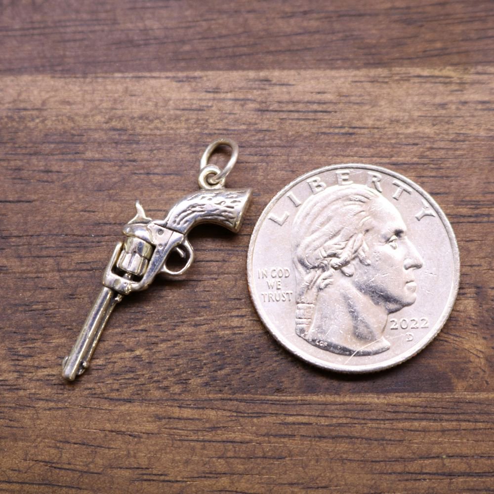 Sterling silver revolver charm with open hammer and attachment loop