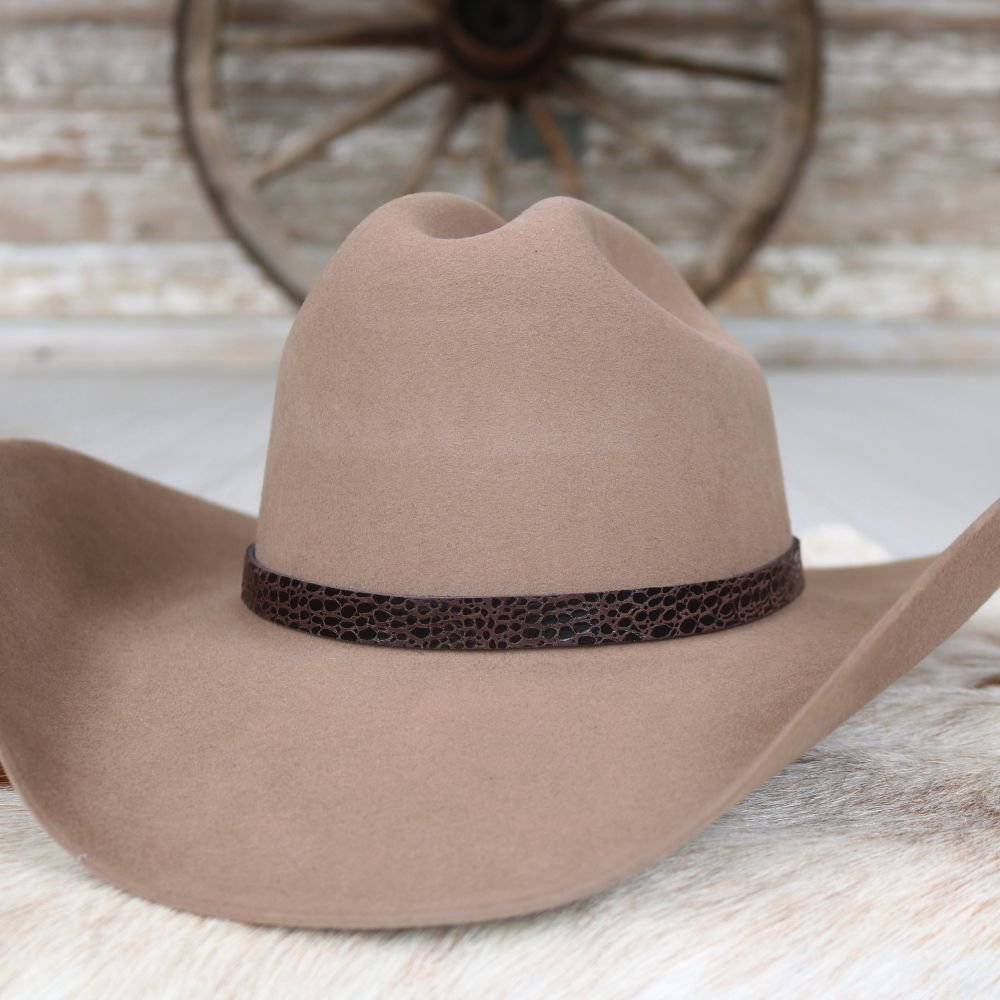 Brown cowboy hat with dark croc-pattern leather band