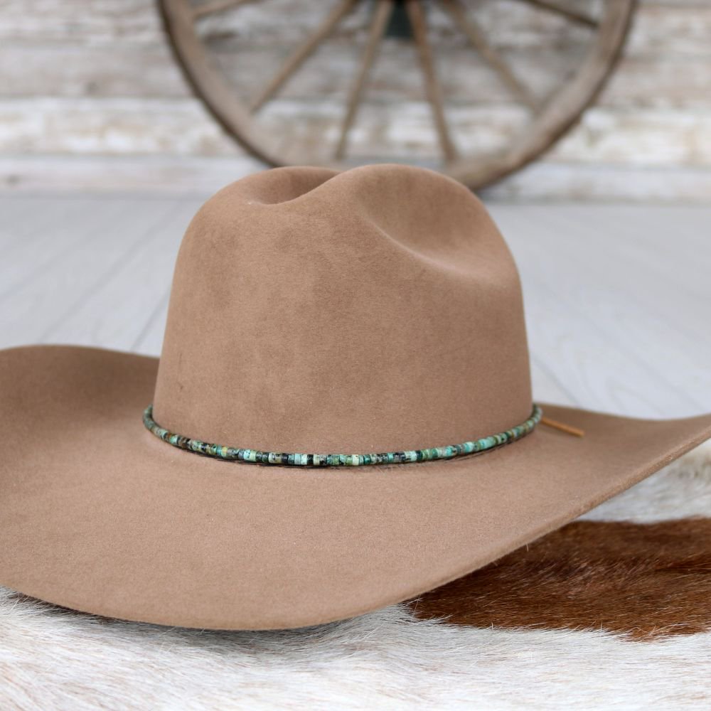 Brown felt cowboy hat with turquoise beaded hat band